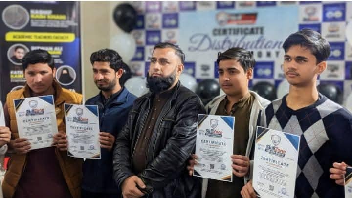 Students holding their certificates at a SkillZone certificate distribution ceremony